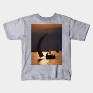 Racing boats at sunset Kids T-Shirt